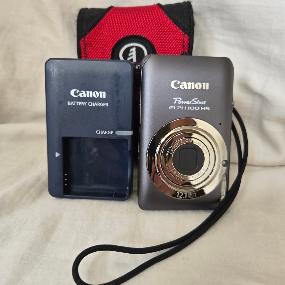 Canon PowerShot ELPH 100 HS 12.1 Mega Pixels 4X Zoom Bundle Tested/Works *read*